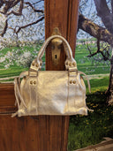 Mini bag in pelle dorata Patricia Castanà