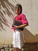 Borsa in pelle marrone con borchie
